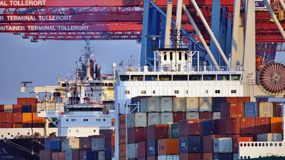 Stacked shipping containers at a seaport terminal