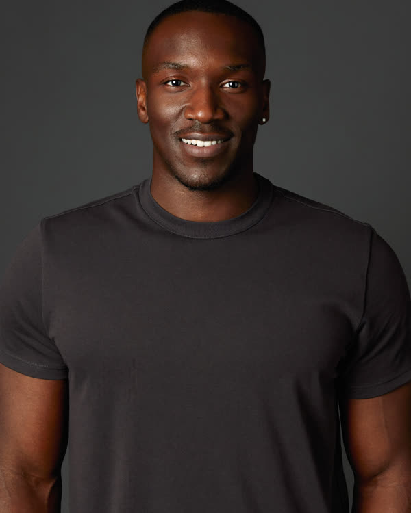 Conditioning coach Ryan Hale, high-contrast black-and-white portrait