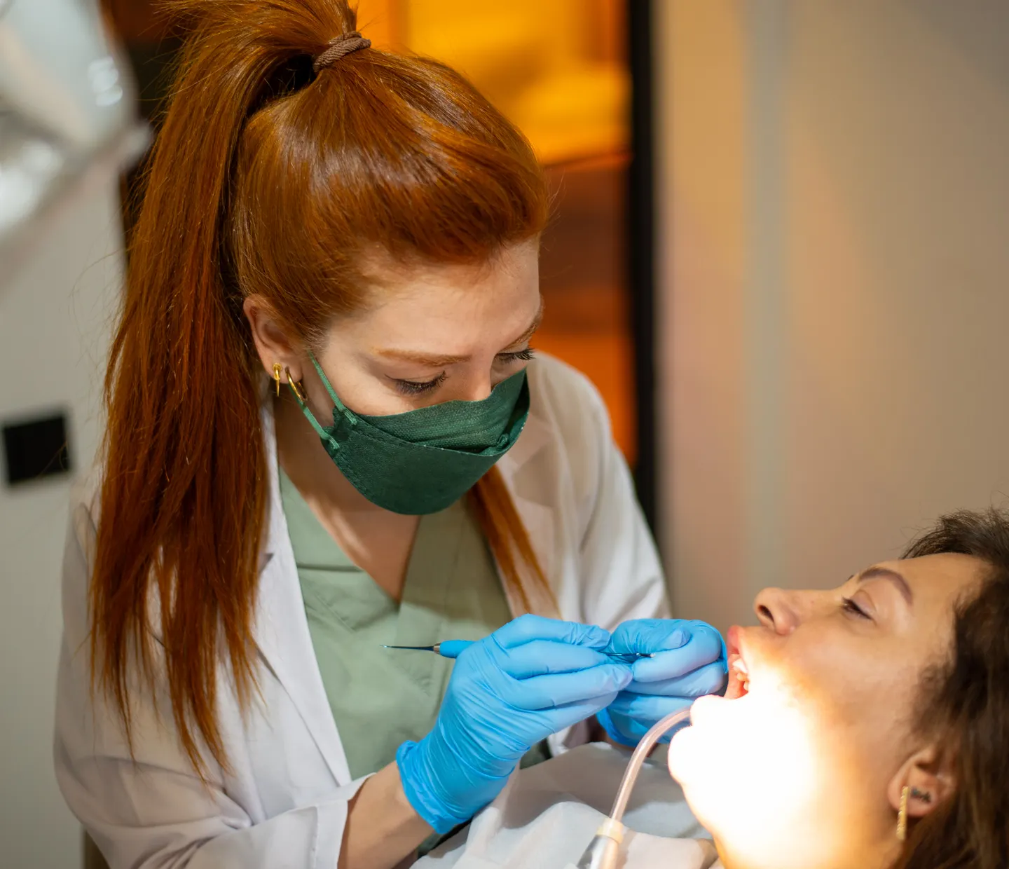 A hygienist's calm, daylight-lit treatment room